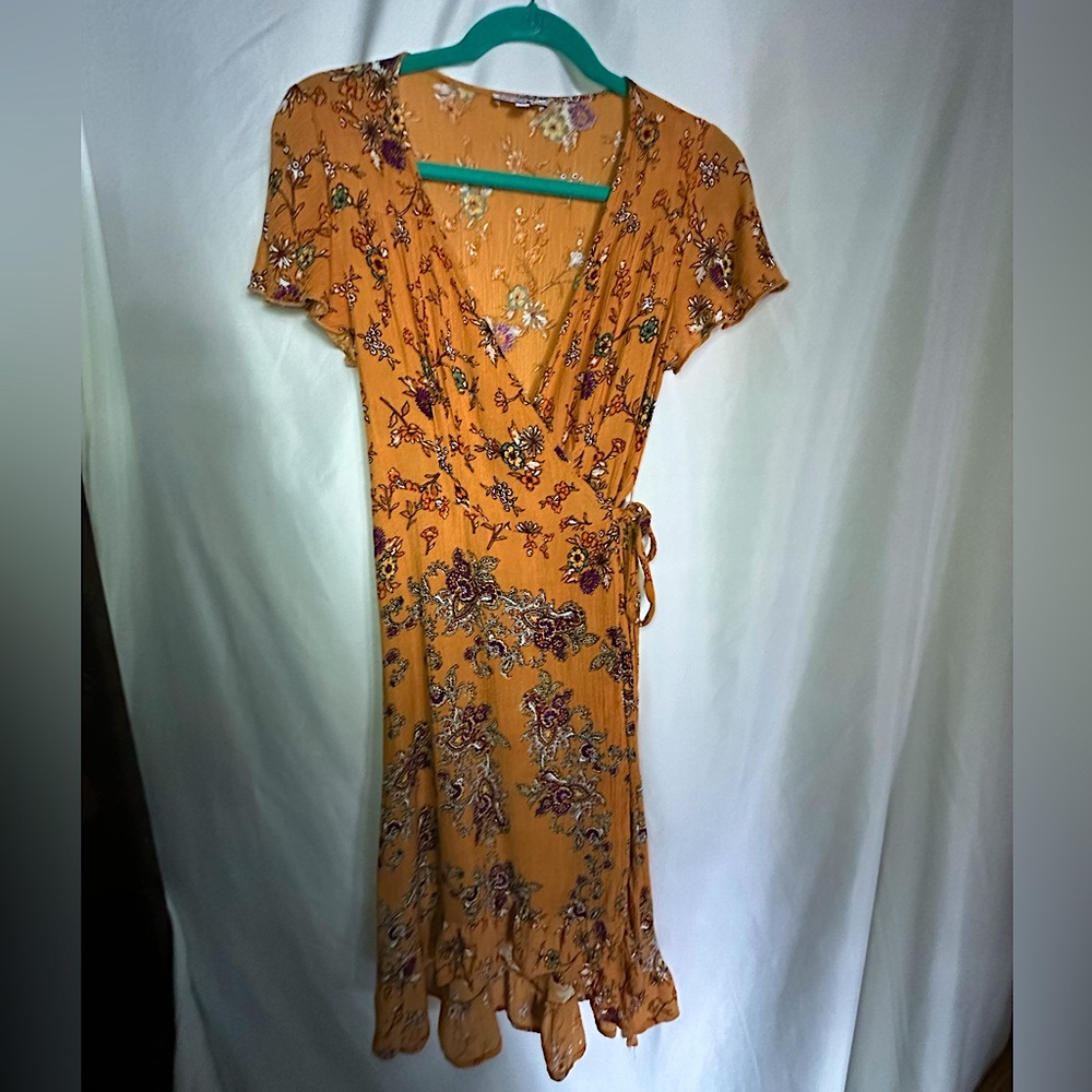 Patrons of Peace Wrap Dress with Ruffles and slight high / low hemline